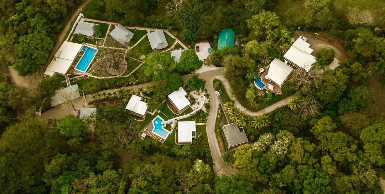 Aerial view of Aves Hotel and Resort tucked into the jungle hills above Montezuma