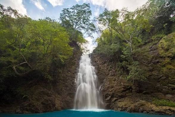 Montezuma waterfall dropping into a turquoise pool